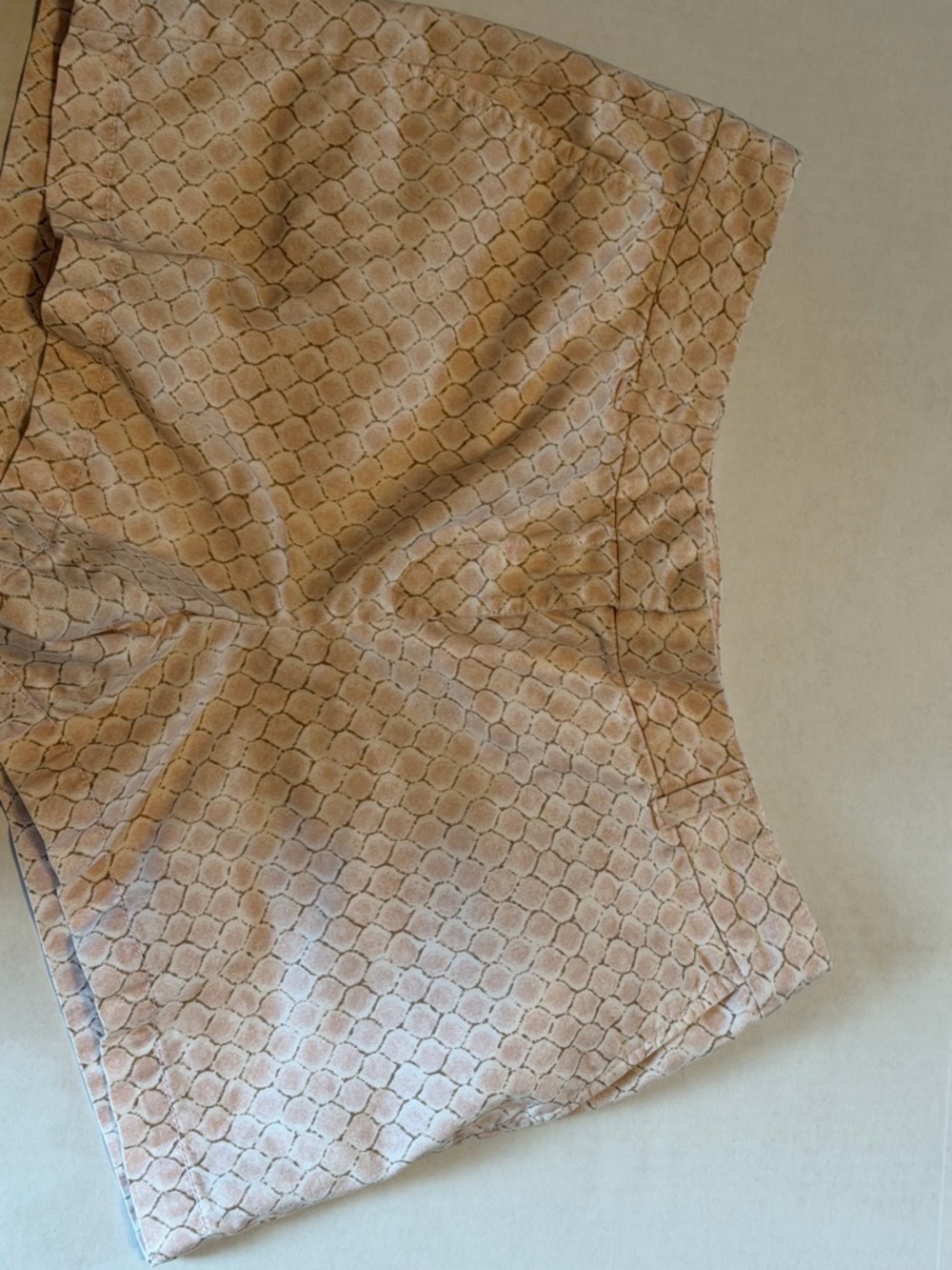 Ann Taylor Loft 4" shorts featuring a geometric print in pink.